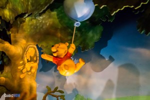 Pooh floating with a balloon - Many Adventures of Winnie the Pooh - Magic Kingdom Attraction