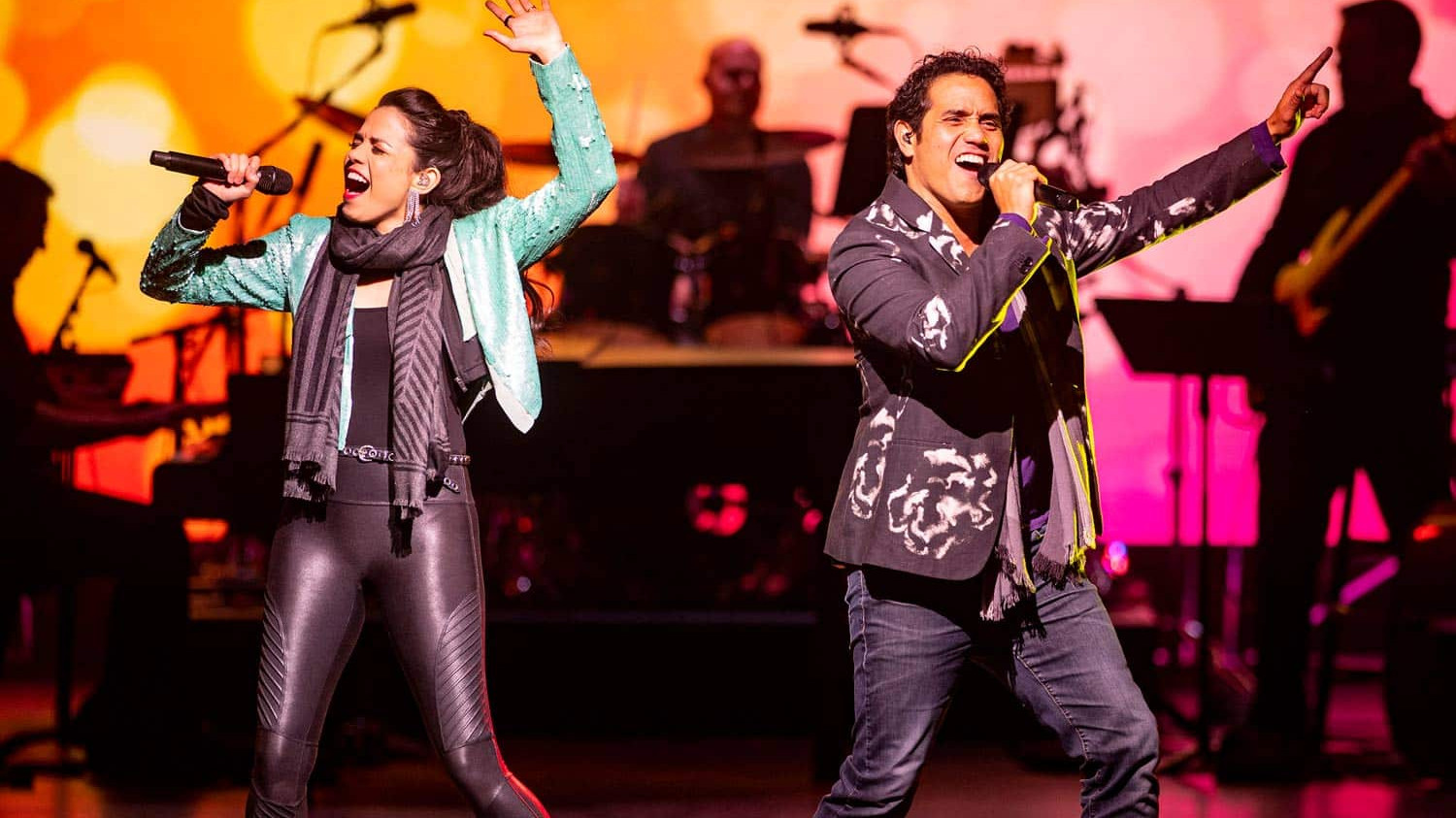 Performers singing during Disney on Broadway concert - EPCOT Festival of the Arts Guide
